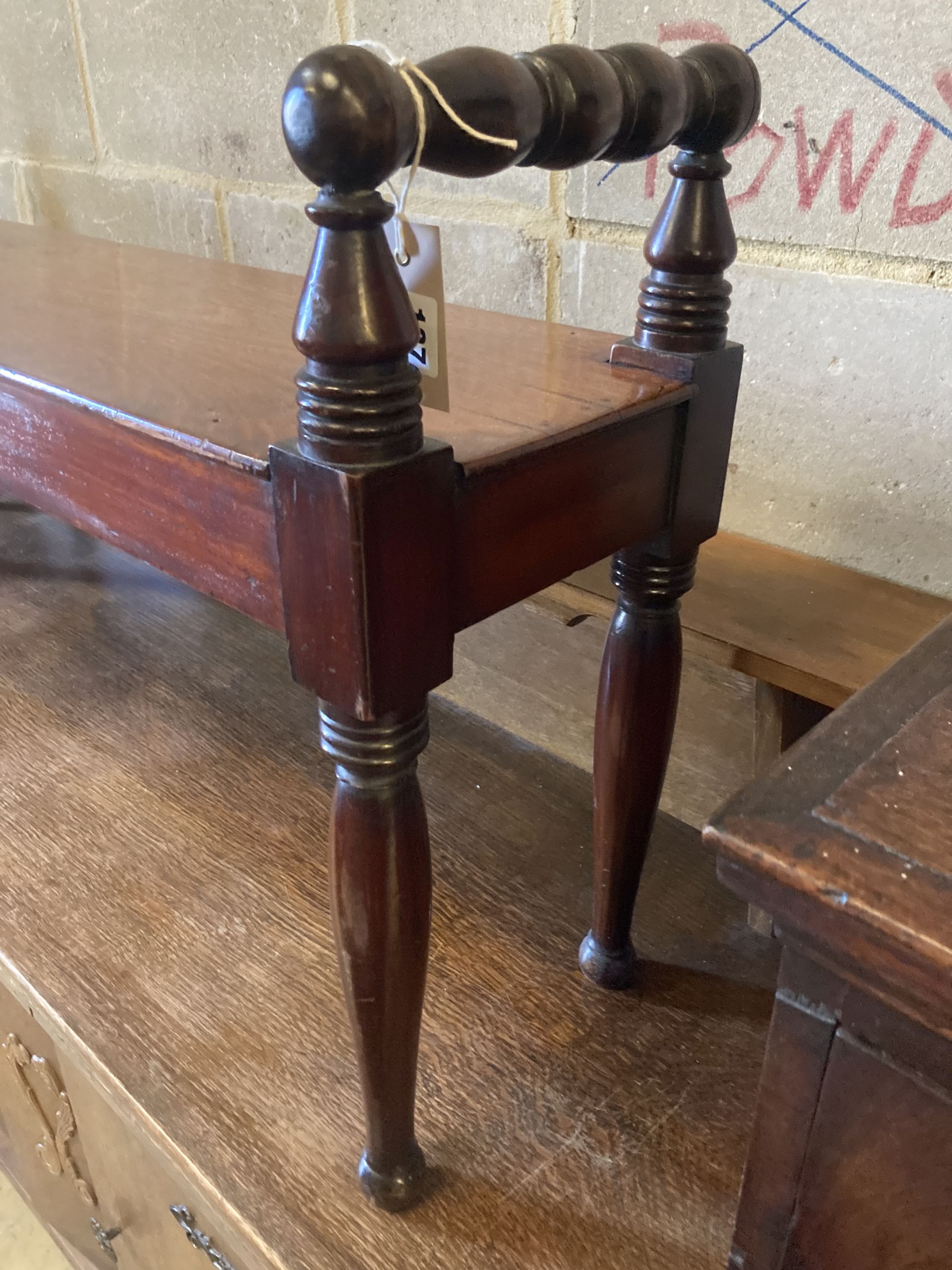 An early Victorian mahogany window seat, width 150cm, depth 28cm, height 60cm